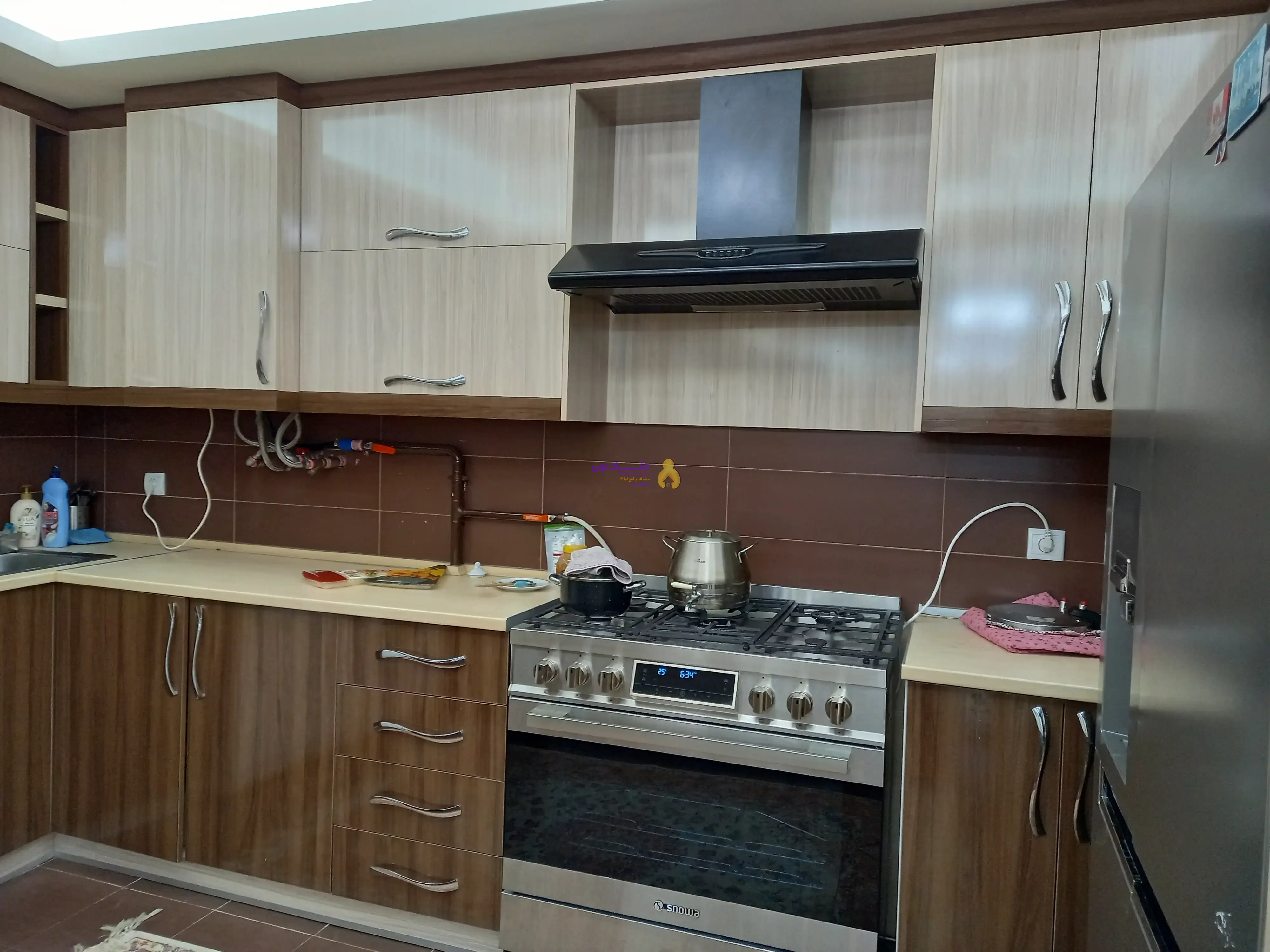 فروش آپارتمان ۱۴۷مترمربع دوخوابه، لوکس،حیاطداررجایی شهر(کوی دانش)