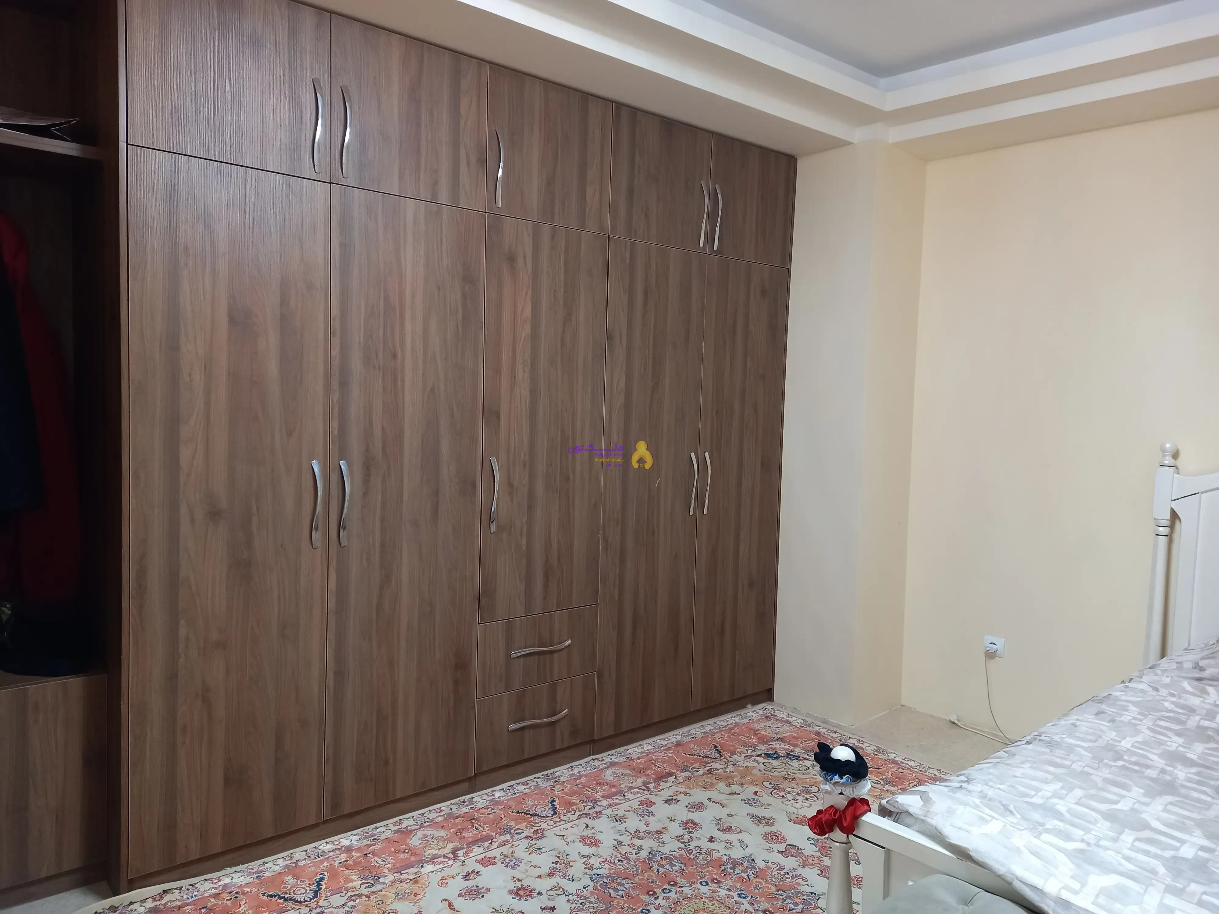 فروش آپارتمان ۱۴۷مترمربع دوخوابه، لوکس،حیاطداررجایی شهر(کوی دانش)